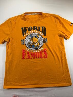 Famous Graphic Tee - Men's Orange Short Sleeve Shirt Lucky Charm